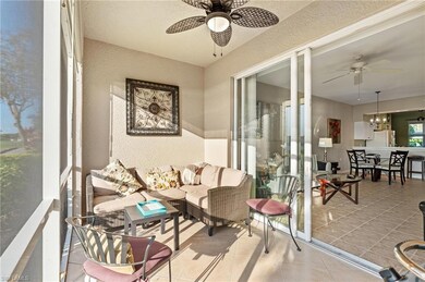 Sunroom with ceiling fan with notable chandelier