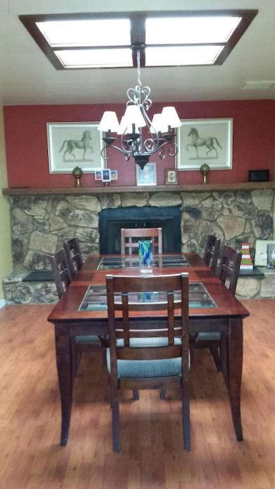 formal dining room with fireplace