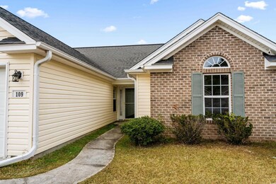 Property entrance with a lawn