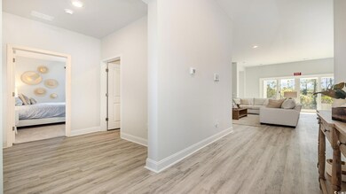 Hall featuring light hardwood / wood-style floors