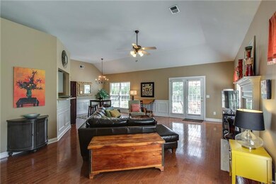 WOW! This Home Shows Like a Model Home! Vaulted Ceilings Greet Guests in this Open & Inviting Floor Plan!  Sellers Have Added NEW Hardwood Floors Throughout Most of the House! 