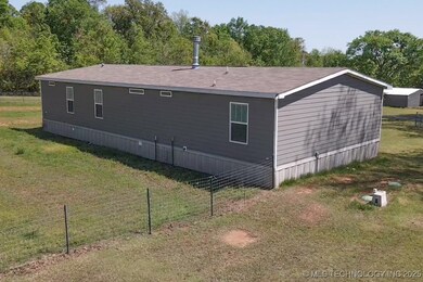 View of property exterior featuring a shingled roo