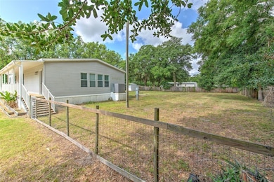 View of Right Side of Home w/ HUGE Backyard!