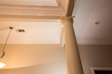 Check out the beautiful crown moldings in the ceil