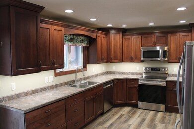 Designed and installed Bertch cabinetry from Special T Woodworks, LG appliances and more