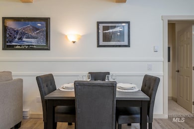 Dining space with wood finished floors
