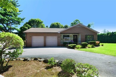 Exterior view of the home from the circular drive.