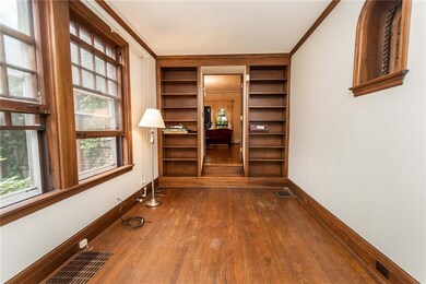 Living room steps down to study.