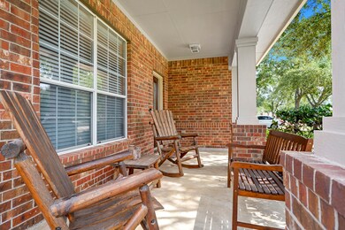 Front porch offered. Notice the all brick home!