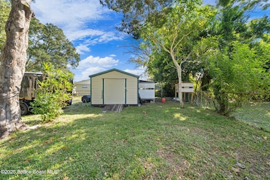 1035 S Mars Ct, Titusville, FL 32796 - photo 7