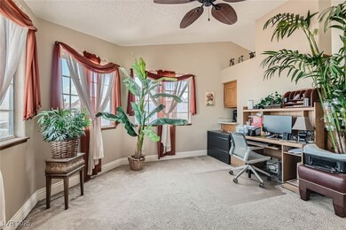 Office space with light carpet, baseboards, ceilin