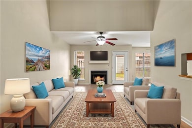 Living room with cozy fireplace (virtually staged)