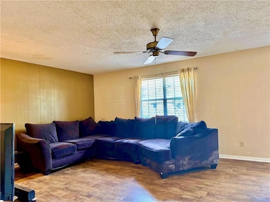 Living room featuring hardwood / wood-style floori