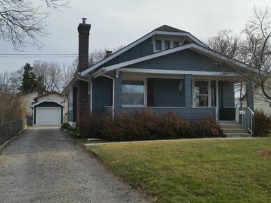 View of Front of Home, Long Driveway & Detached Ga