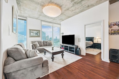 Living area featuring wood finished floors
