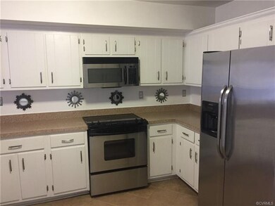 Lots of Bright Cabinets. Appliances Convey