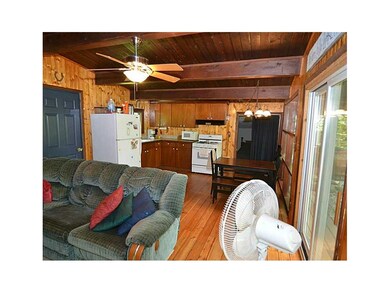Kitchen. At right sliders to deck.