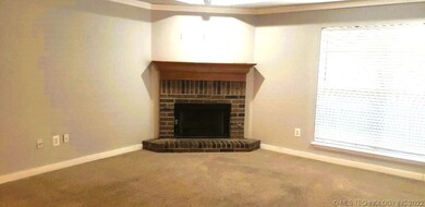 Gas log fireplace in living room
