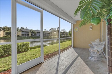 Sunroom / solarium with a water view and a healthy