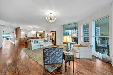 Living room open to dining area and kitchen.