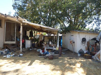 Covered area behind house