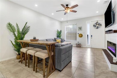 Living room featuring light tile patterned floors 