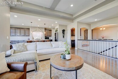 Living room featuring light hardwood / wood-style 