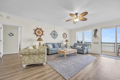 Living room with ceiling fan, light wood-type floo