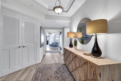 Hallway with light hardwood / wood-style flooring,