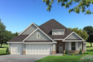 View of front of property with a garage and a front lawn