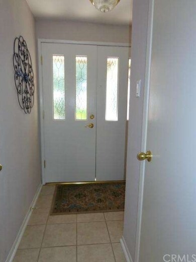 Entry hall with coat closet