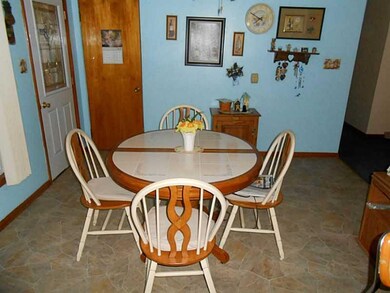 Dining Room. Eat-in-kitchen with room for China cu