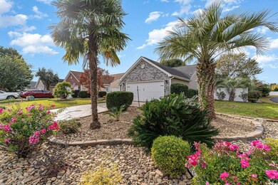 View of yard featuring a garage