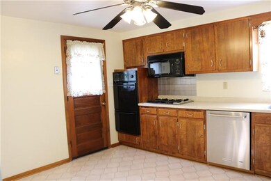 Kitchen with double oven, gas stove top.  Eat in a
