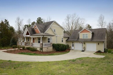 Attached garage features room for 2 cars, tons of storage and an amazing garage apt.