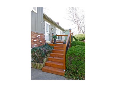 New front deck/porch adds to charm of the home.