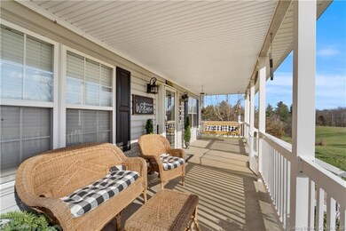 Enjoy the covered front porch, that offers space f