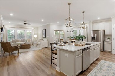 Open floor plan with wide plank LVP flooring throu