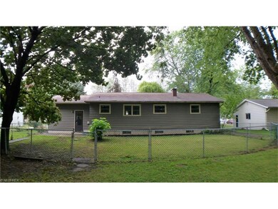 Back of home. Fenced area ideal for pets