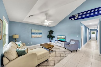 Home features vaulted ceilings.