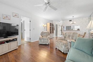 View from living room toward primary bedroom
