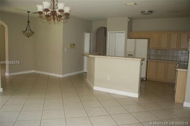 Kitchen dining area, snack counter and large famil