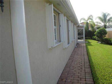 Home features accordion shutters on all windows