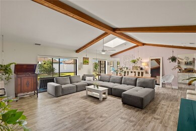 Living room with hardwood / wood-style flooring, l