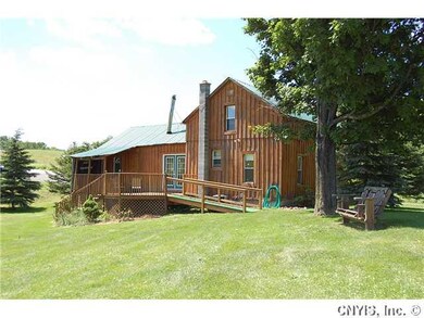 Exterior Back. 1.9 acre yard