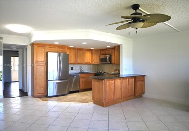 74 Windsor D, West Palm Beach, FL 33417 - photo 2