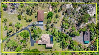 Bird's eye view of entire 5 acres with both reside