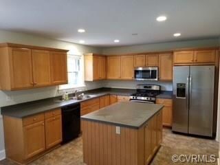 Large kitchen with gas cooking and stainless steel