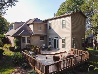 Deck opens up off the bonus room, which opens up off the kitchen. Very functional for entertaining!