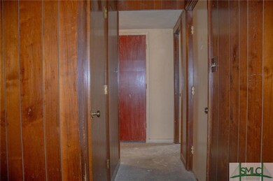 Entry to bedrooms behind front door. Looking from 